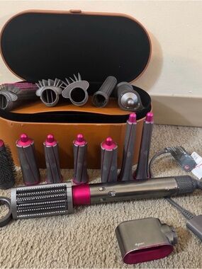 Dyson multi-styler set in pink and gunmetal